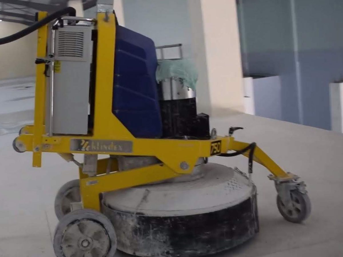 Kitengela Terrazzo floor grinder polishing a terrazzo floor to a mirror finish